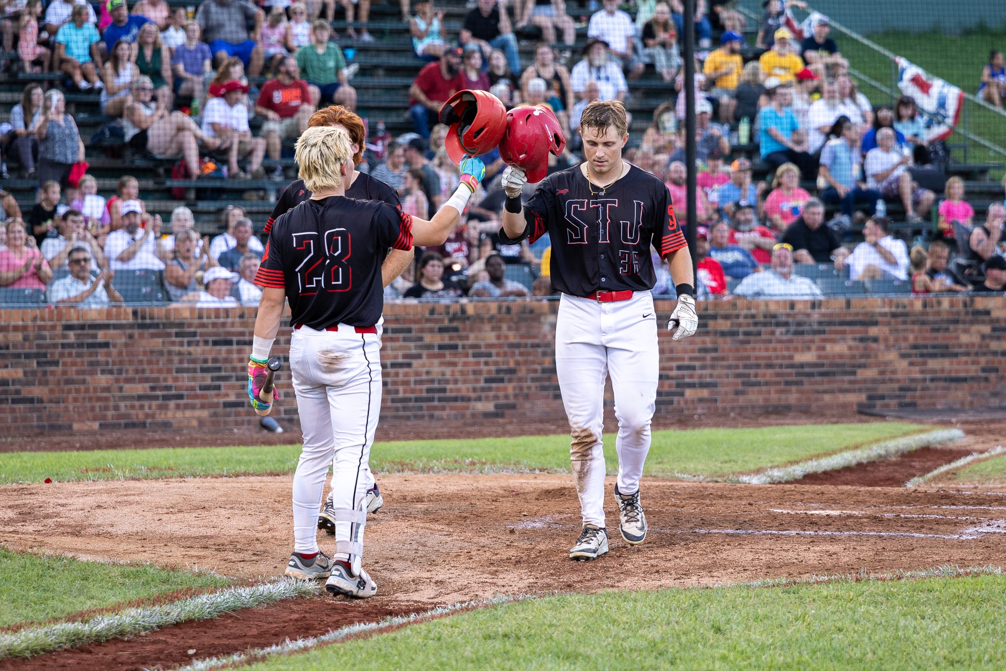 The St. Joseph Mustangs needed extra innings to sneak past the Nevada Griffons in the MINK League semifinals.